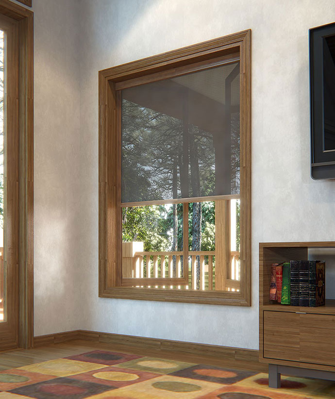 Large wood-framed window with retractable screen showing outdoor deck and railing through clear mesh